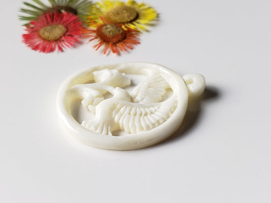 Hummingbird with hole on top.